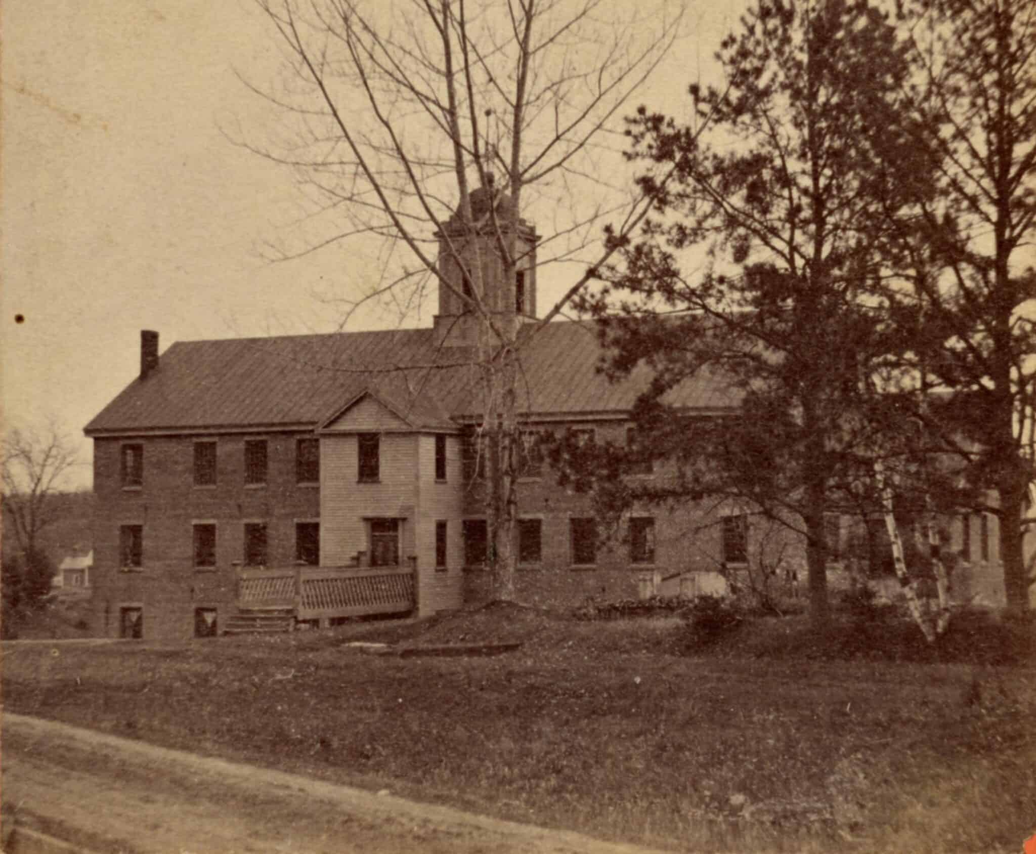 Black-and-white photograph of the silk mill and NAEI boarding house.