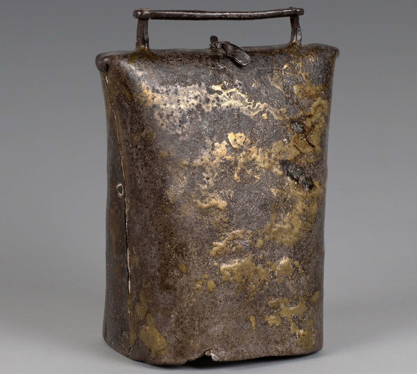 Aged cow bell.