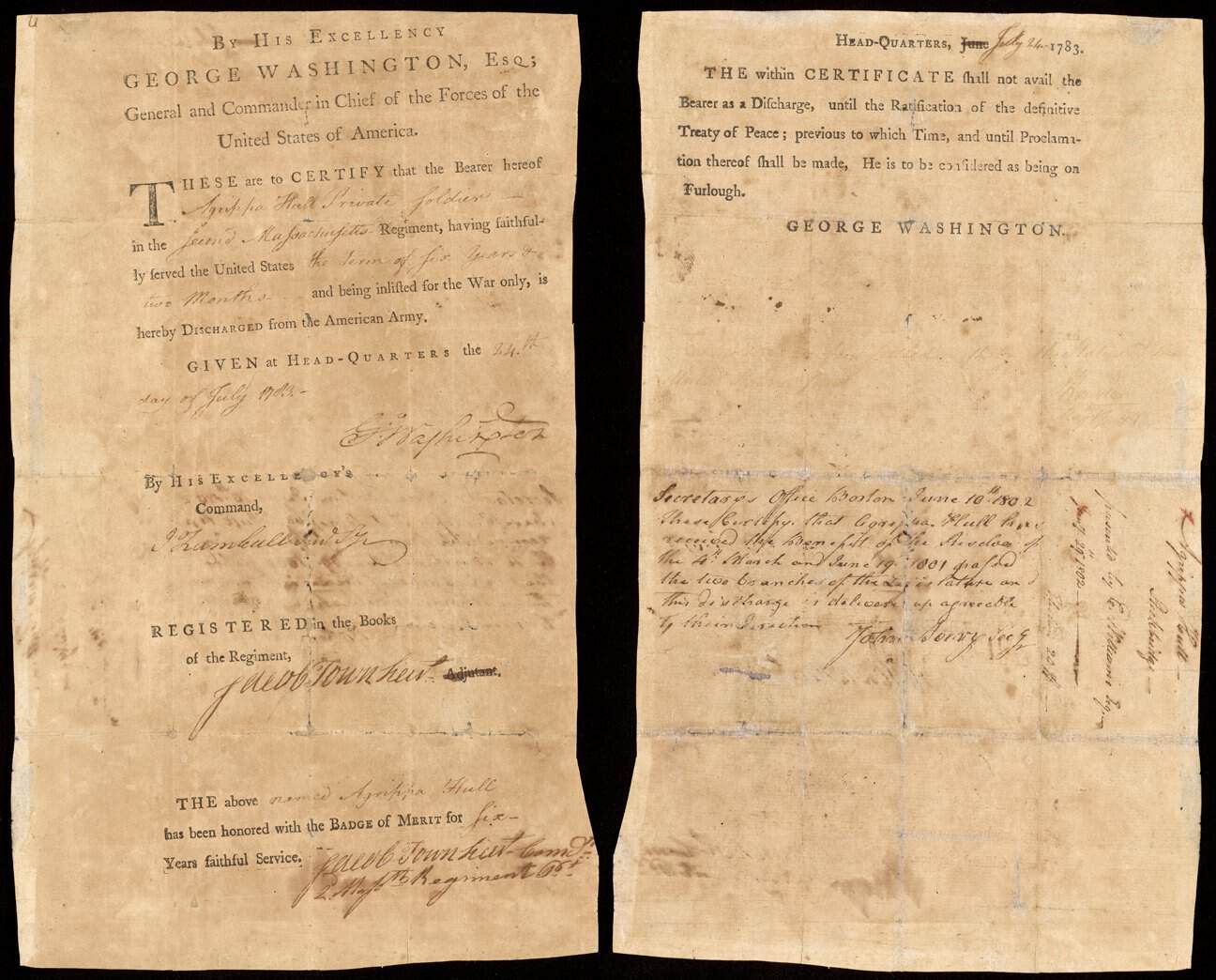 Photograph of a Agrippa Hull's double-sided discharge papers on yellowed paper.