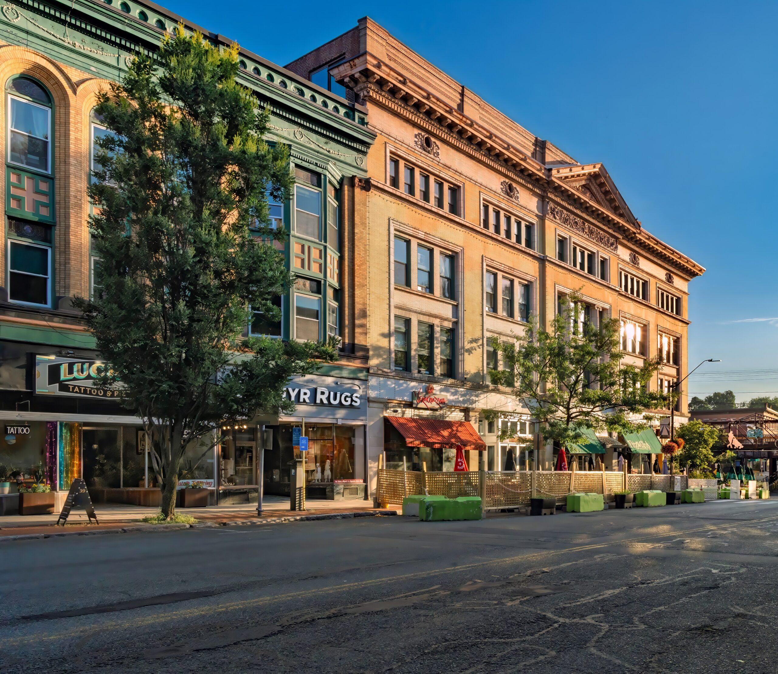 Color photo of buildings on lower Main street, including Masonic building where Fitzwilly's restaurant lives.