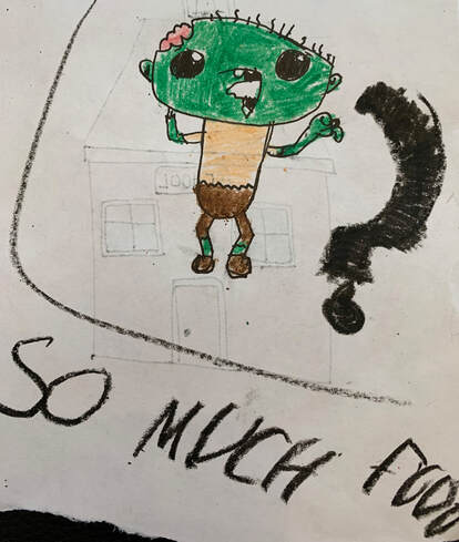 Child's drawing of a green creature.