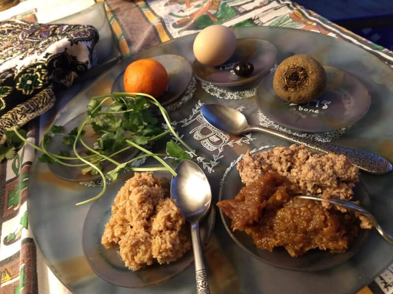 closeup photo of seder foods on a tray