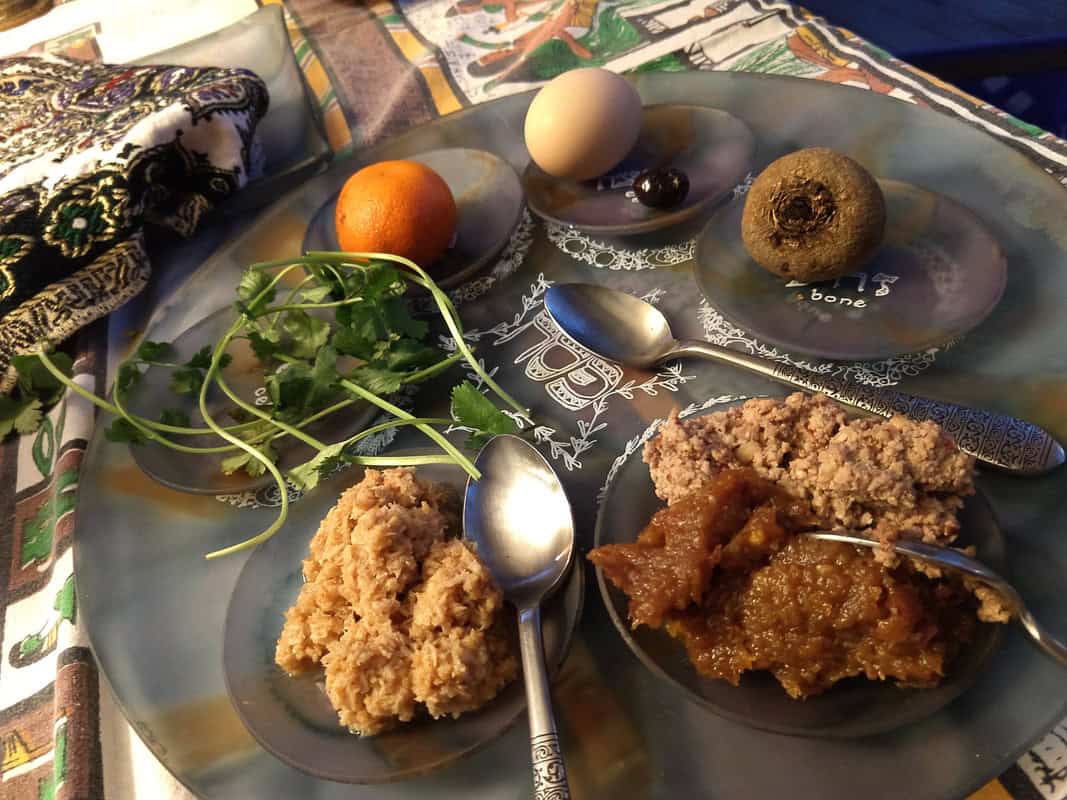 closeup photo of seder foods on a tray