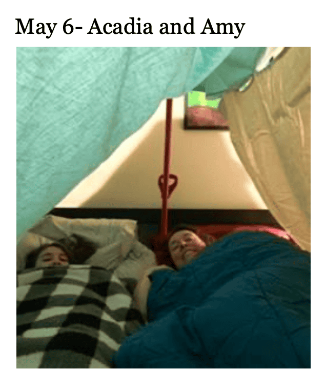 photo of two people in homemade tent