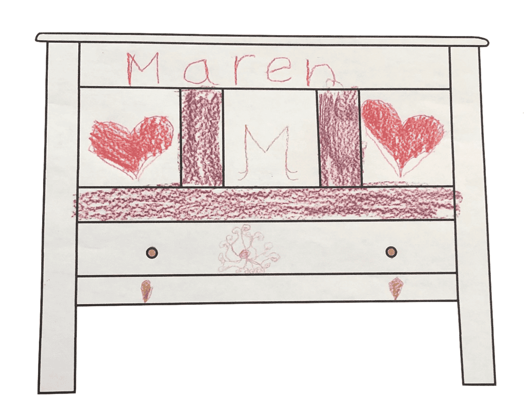 illustration of a chest with drawing and writing on it