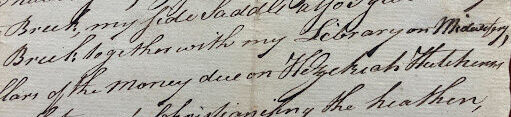 A photograph of section of handwritten document that states "my [Betty Allen's] library on midwifery..." goes to her daughter.