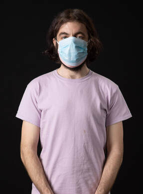 photo of person wearing face mask and t-shirt