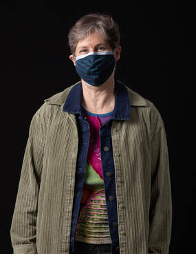photo of person wearing face mask and jacket