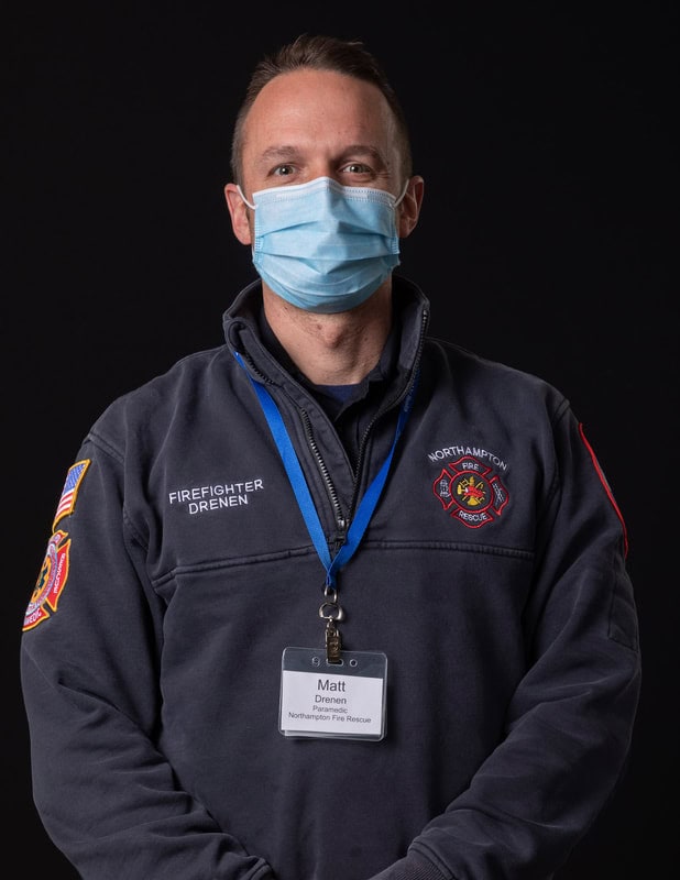 Photo of person wearing face mask and Northmpton fire department sweatshirt